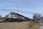 The NJT 4104 and C&D 2006 lead the DRRV Toys for Tots Train across Rt. 46 in the Kenvil part